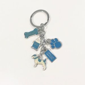 Coach key chain with blue dog charms